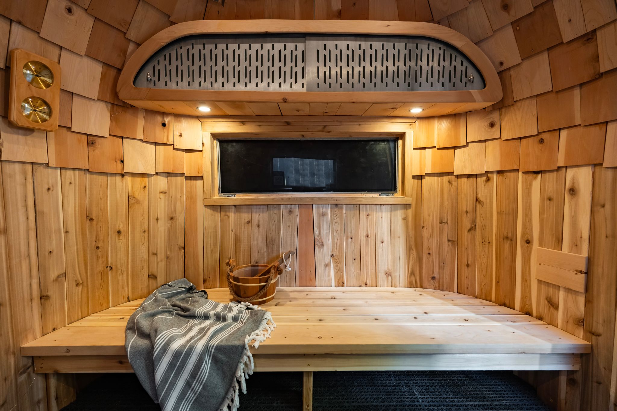 Cedar sauna bench with window and thermometer