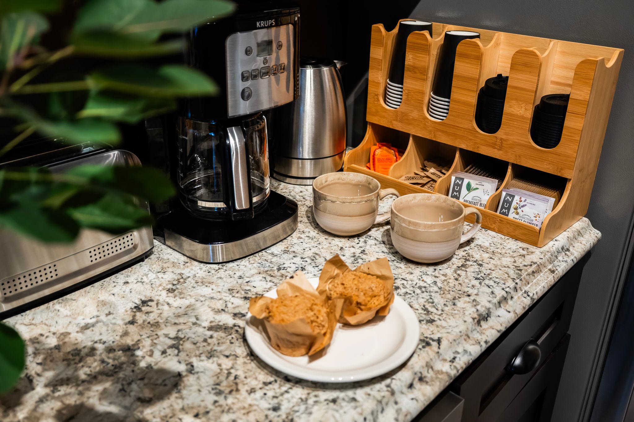 Coffee and tea station with fresh muffins