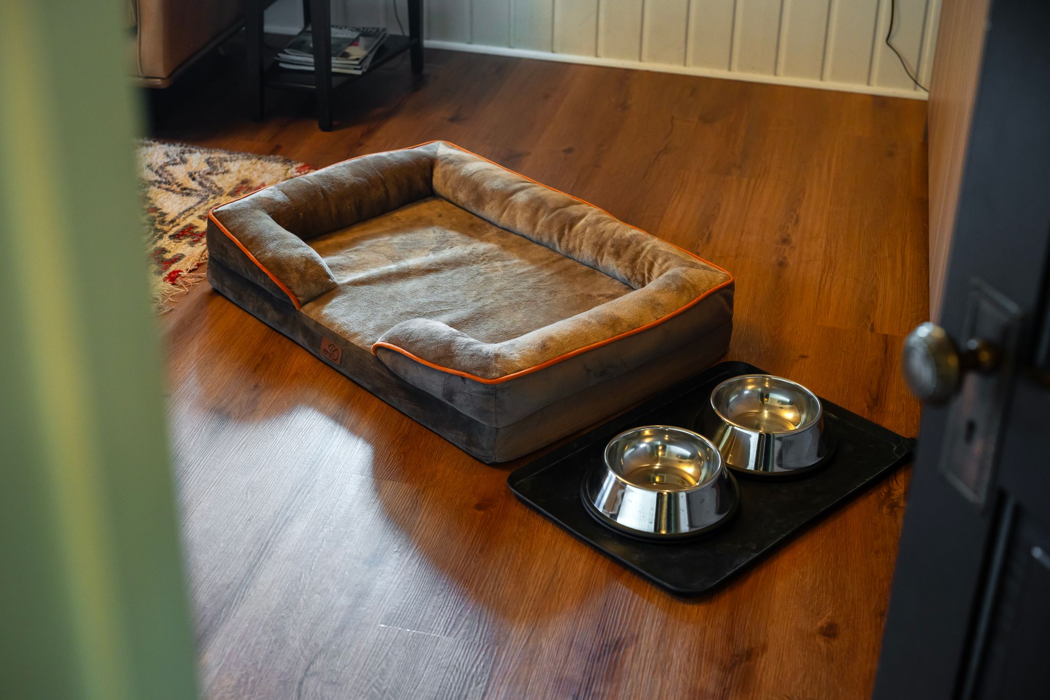 Dog bed and bowls — pet-friendly retreat