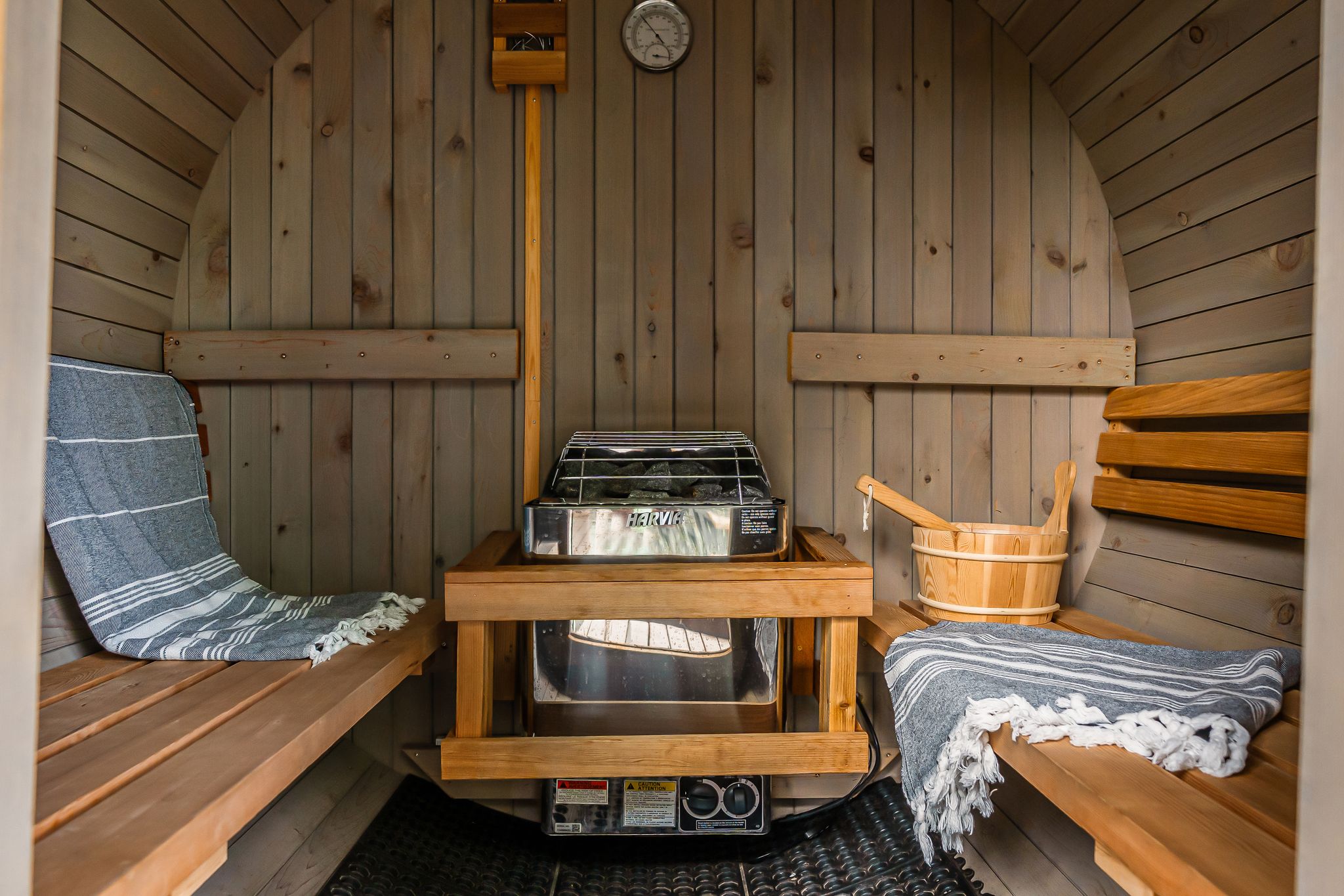 Interior of the cedar barrel sauna with Harvia heater